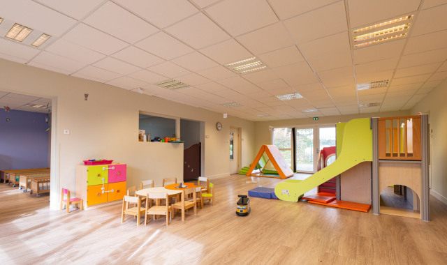 Photo de la salle de vie de la crèche Pim Pam Pomme