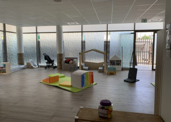Salle de vie de la crèche Baby Eveil Près d'Arènes