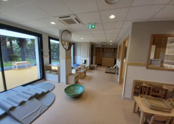 Salle d'éveil au sein de la micro-crèche Babilou Enghien Division Leclerc